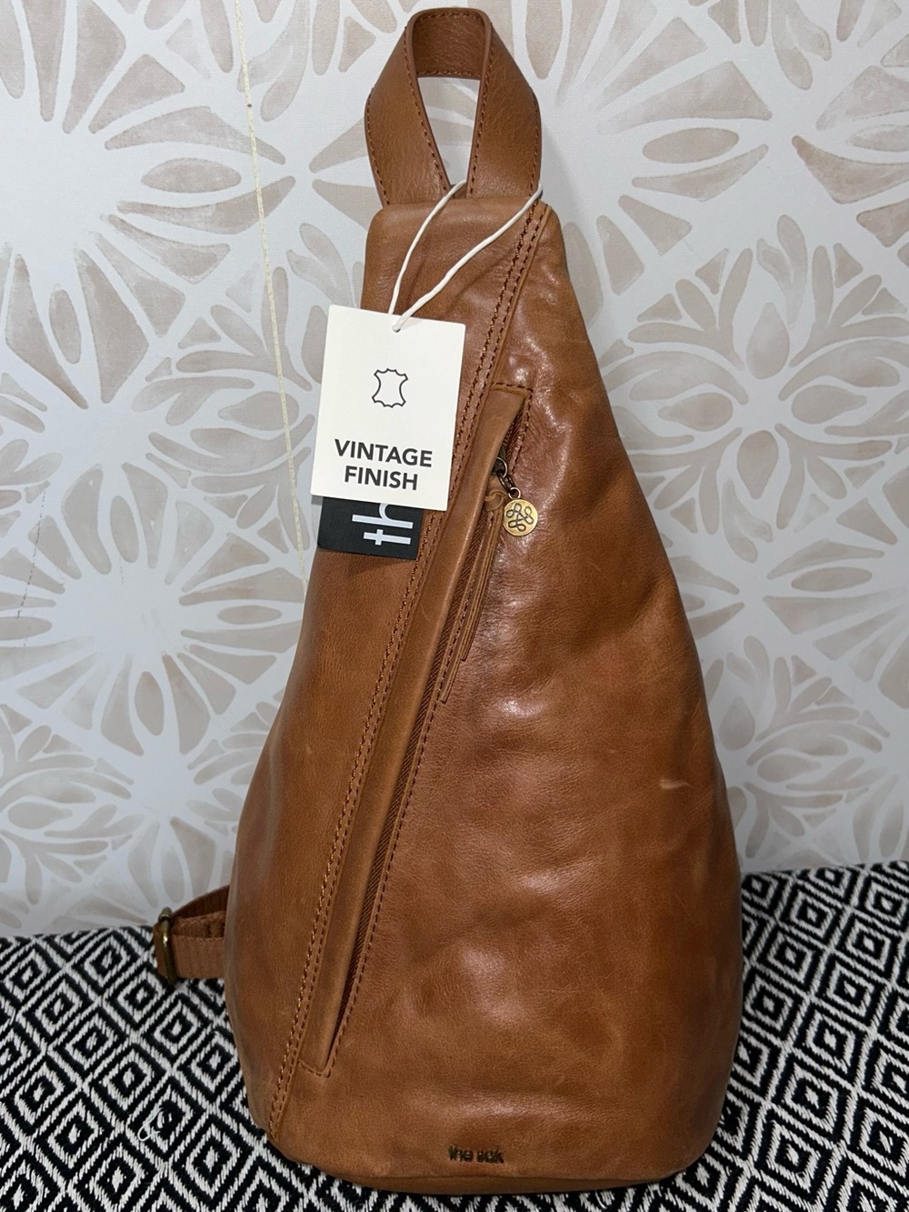 The Sak Geo Sling Leather Backpack in Teak NWT